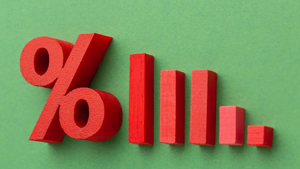 Red percent symbol with ascending bar chart blocks on a green background, representing finding the percentage of a number